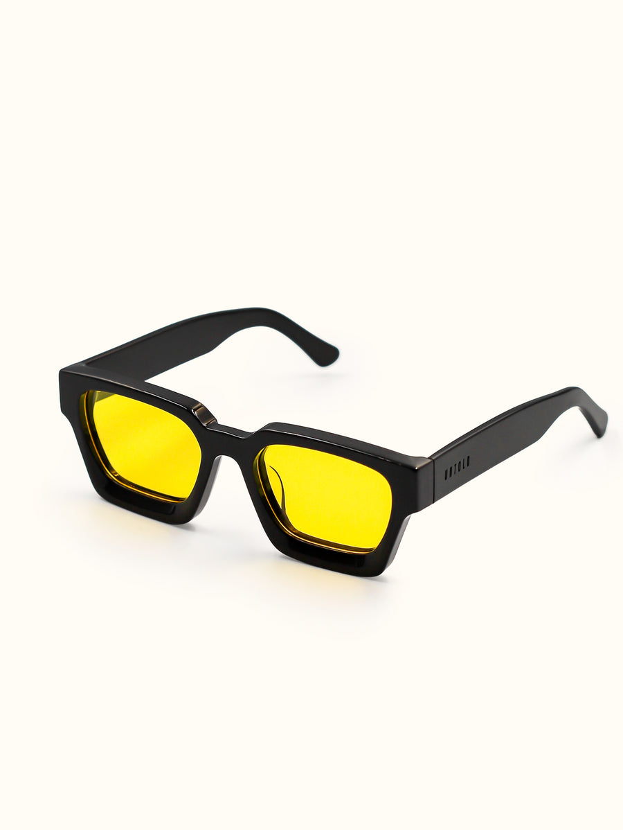 Black sunglasses with yellow lenses on a white background