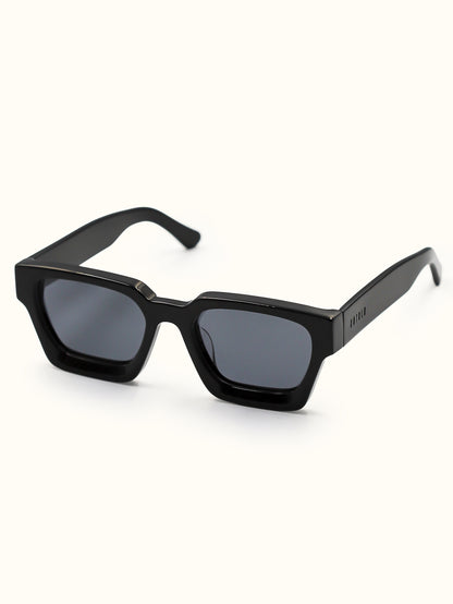Black sunglasses with a white background