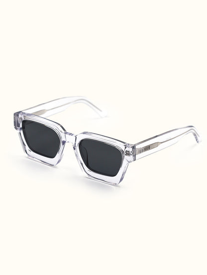 Clear frame sunglasses with black lenses on a white background