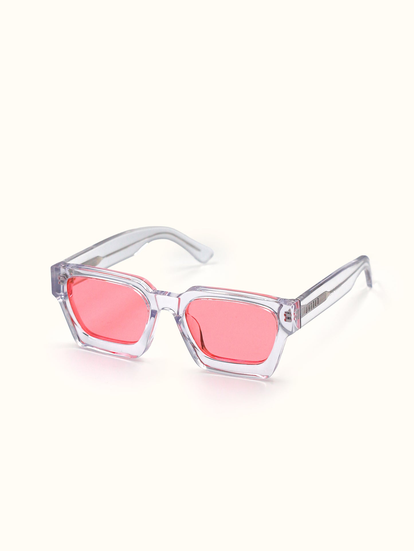 Sunglasses with clear frame and pink lenses on a white background