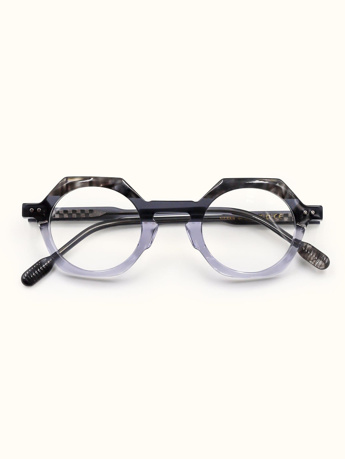 Round eyeglasses with a black frame on a white background