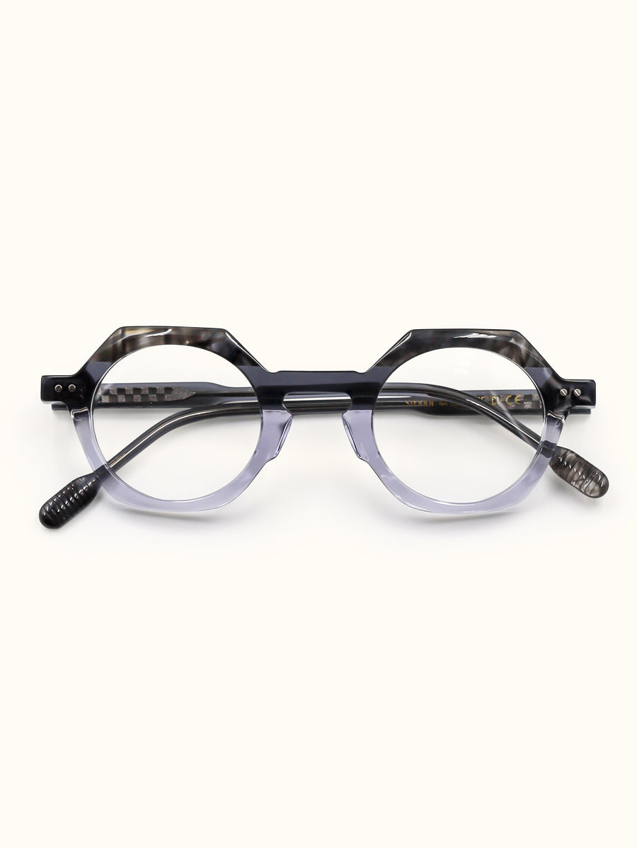 Round eyeglasses with a black frame on a white background
