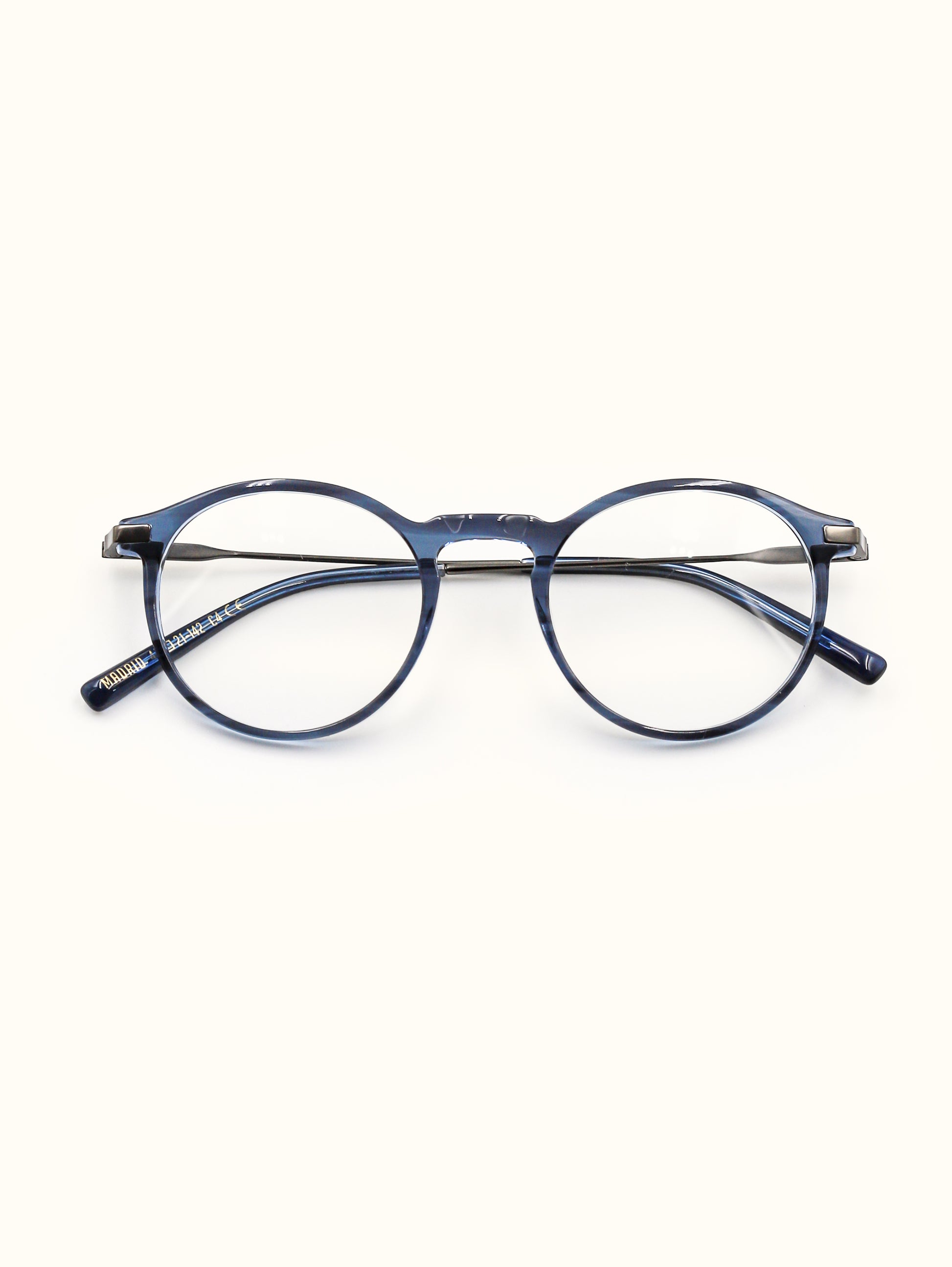 Blue eyeglasses on a white background