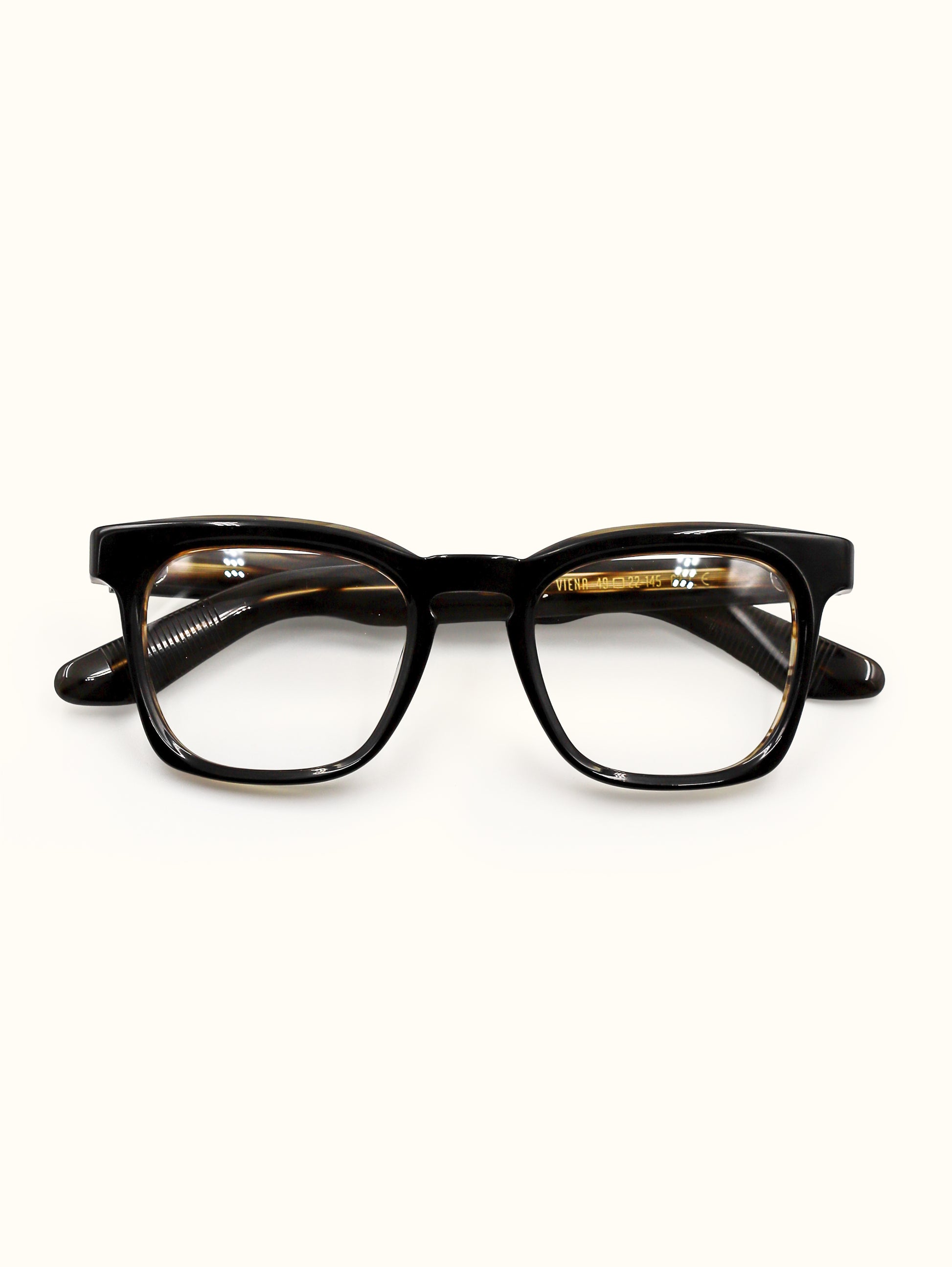 Black eyeglasses on a white background