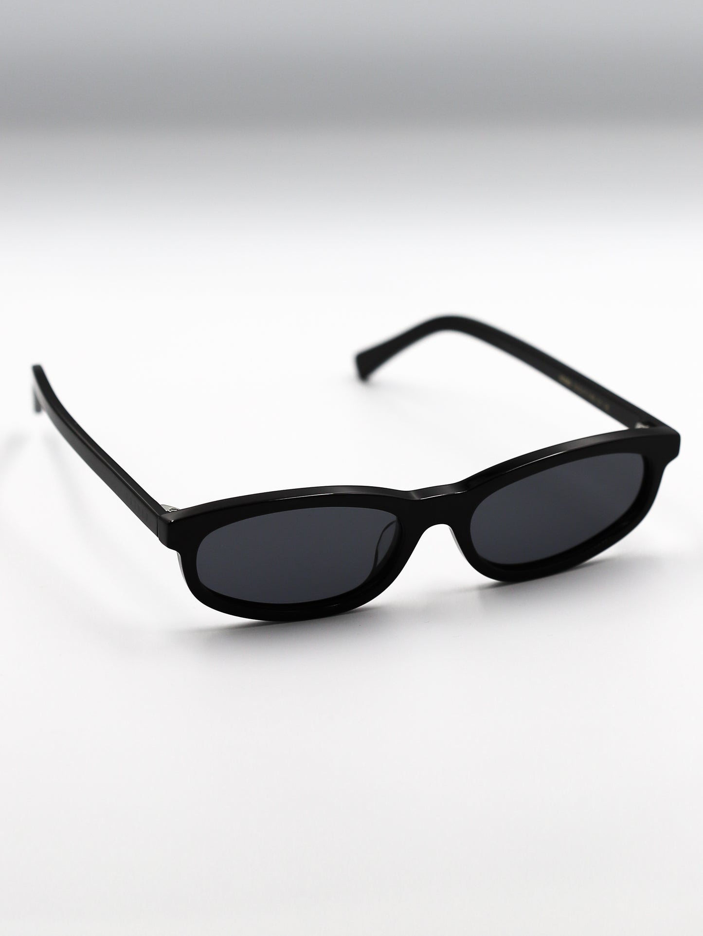 Black sunglasses on a white background