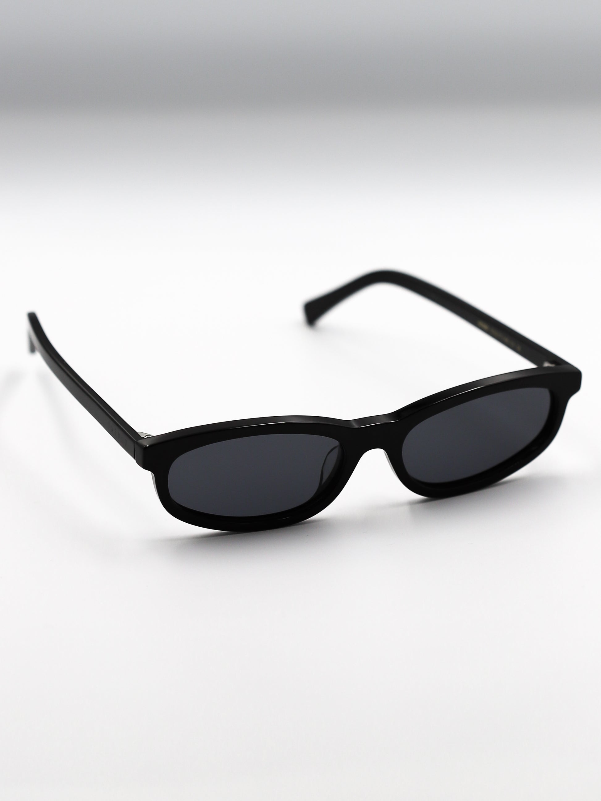 Black sunglasses on a white background