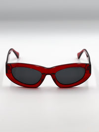 Thumbnail for Red sunglasses with dark lenses on a white background