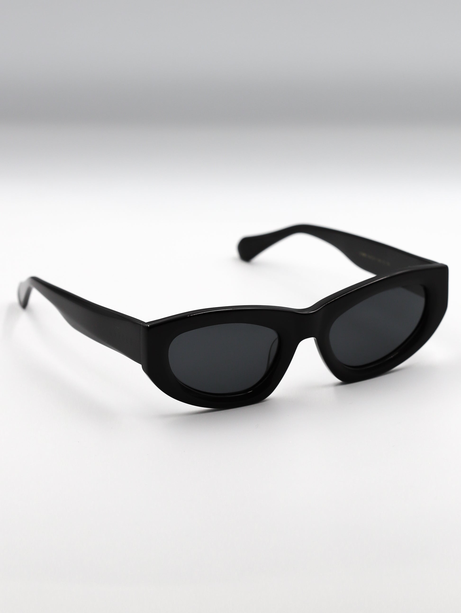 Black sunglasses on a white background