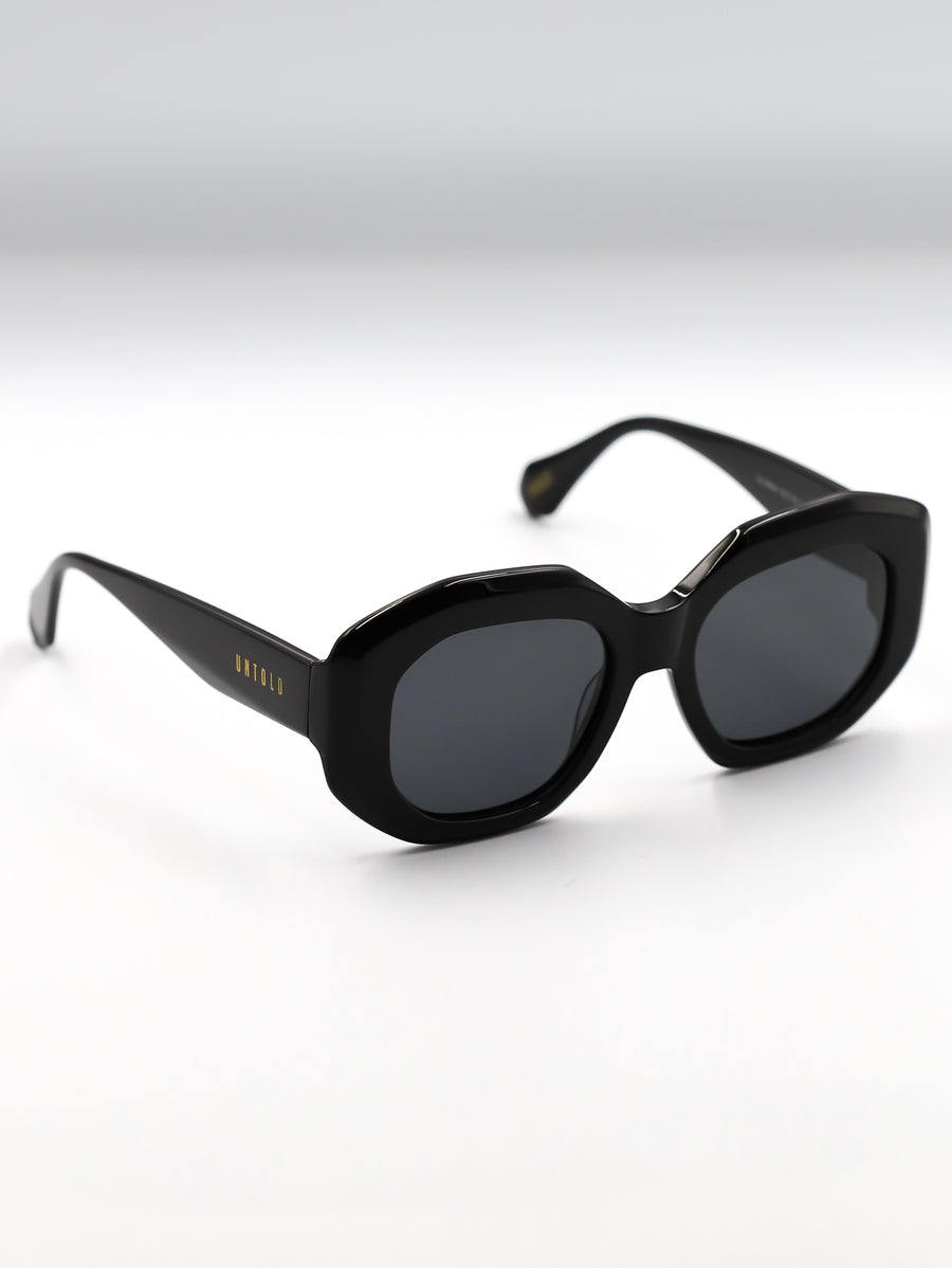 Black sunglasses with a blurred background