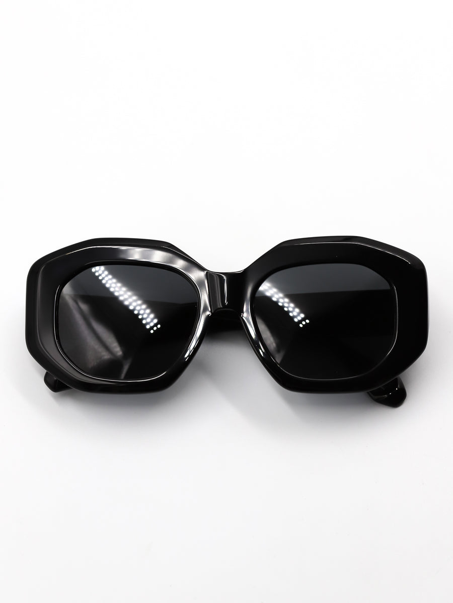 Black sunglasses with a reflective surface on a white background