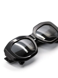 Thumbnail for Black sunglasses with reflective lenses on a white background