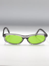 Thumbnail for Sunglasses with green lenses and clear frames on a gradient gray background