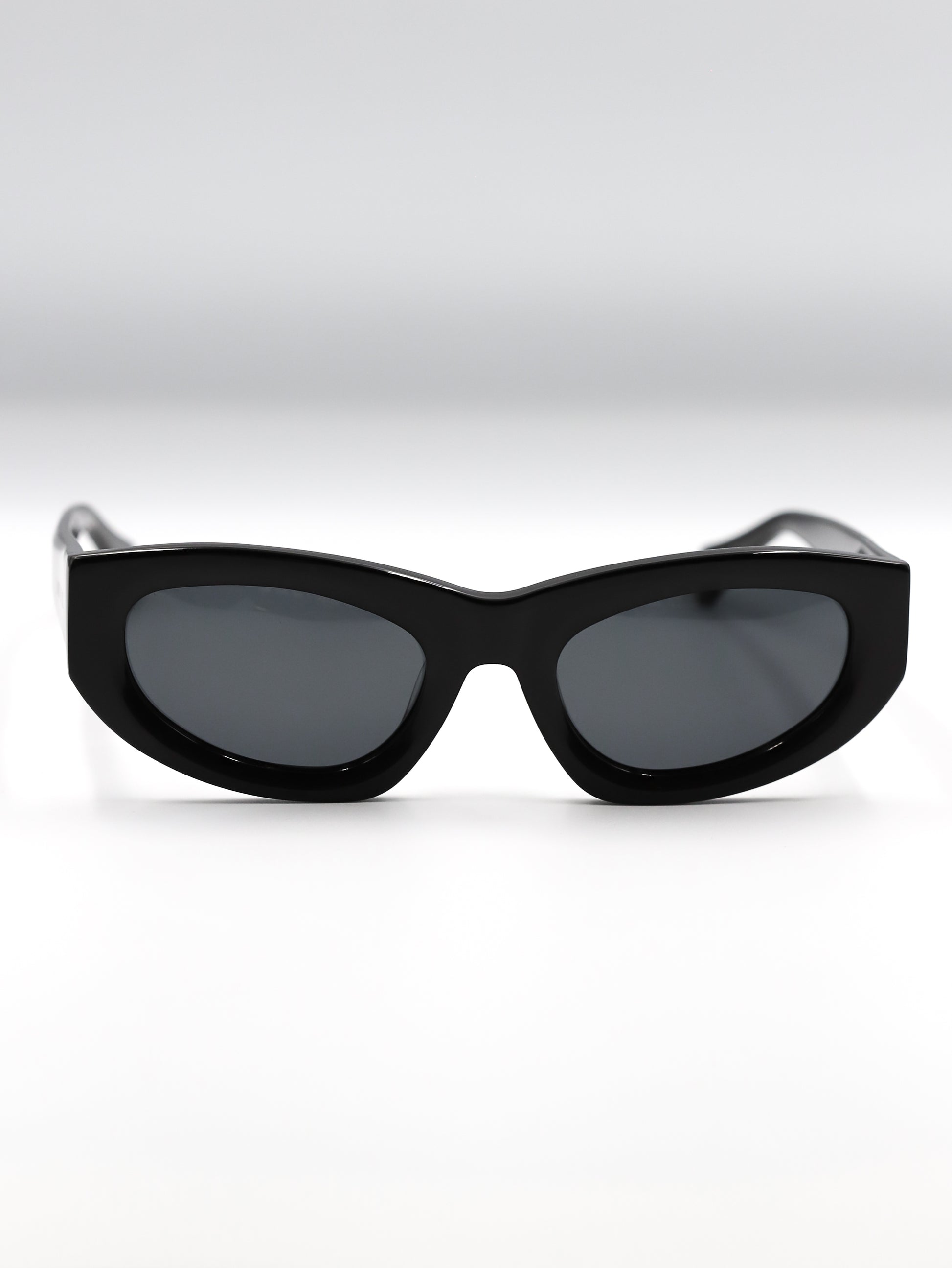 Black cat-eye sunglasses on a white background