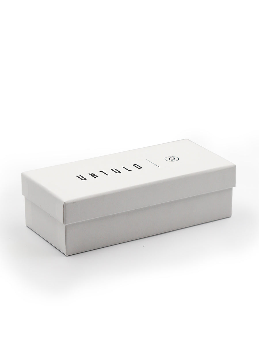 White box with 'Untold' branding on a white background