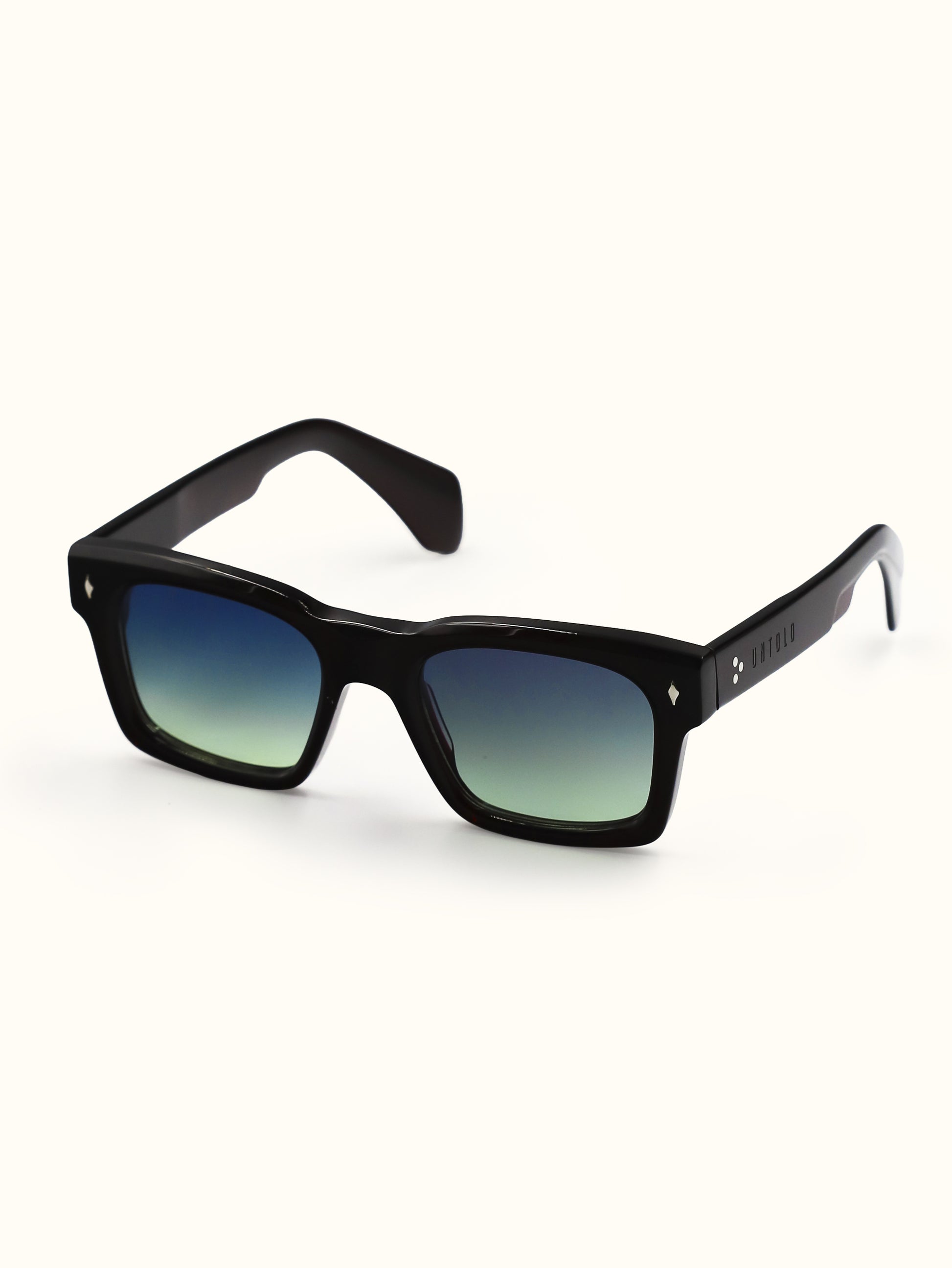 Black sunglasses with gradient lenses on a white background