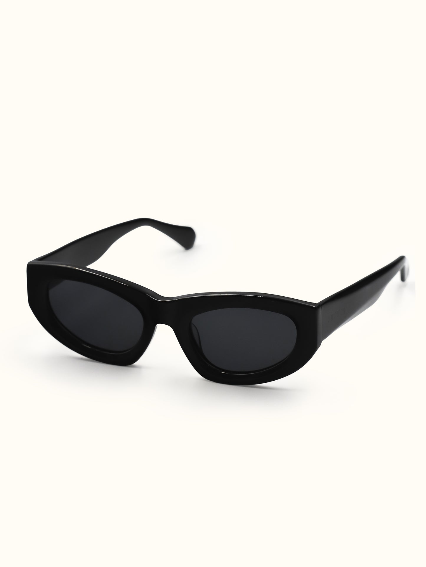 Black cat-eye sunglasses on a white background